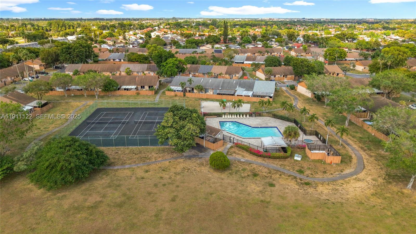 6722 Northwest 192nd Lane Hialeah, FL 33015 - Photo 45 of 46 an aerial view of residential houses with outdoor space