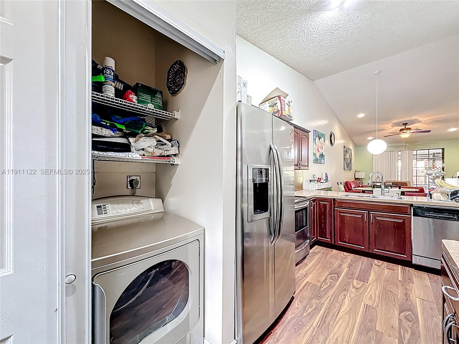 6722 Northwest 192nd Lane Hialeah, FL 33015 - Photo 8 of 46 a view of living room washer and dryer