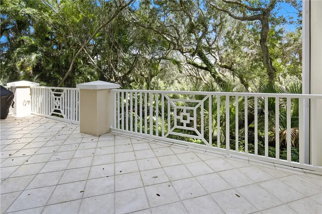 a front view of a house with a yard and a garage
