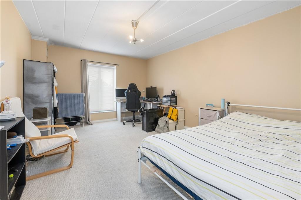 5 Bayard Road, Unit 808 Pittsburgh, PA 15213 - Photo 16 of 33 a bedroom with bed and window