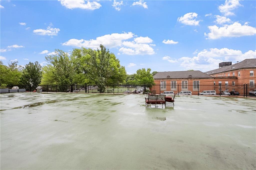 5 Bayard Road, Unit 808 Pittsburgh, PA 15213 - Photo 32 of 33 a view of swimming pool with outdoor seating and trees in the background