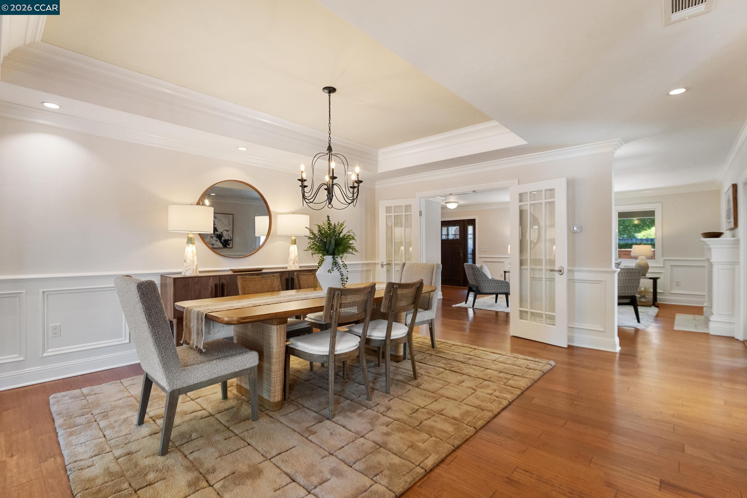 484 Diablo Road Danville, CA 94526 - Photo 9 of 39 a view of a dining room and livingroom with furniture wooden floor a chandelier