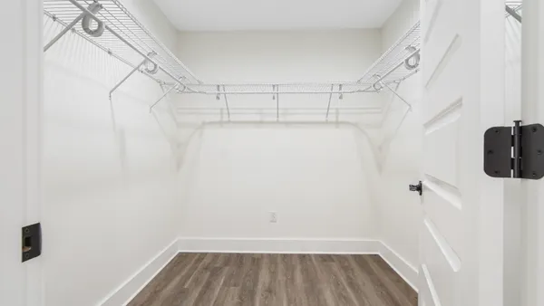 a view of a room with racks on the wall