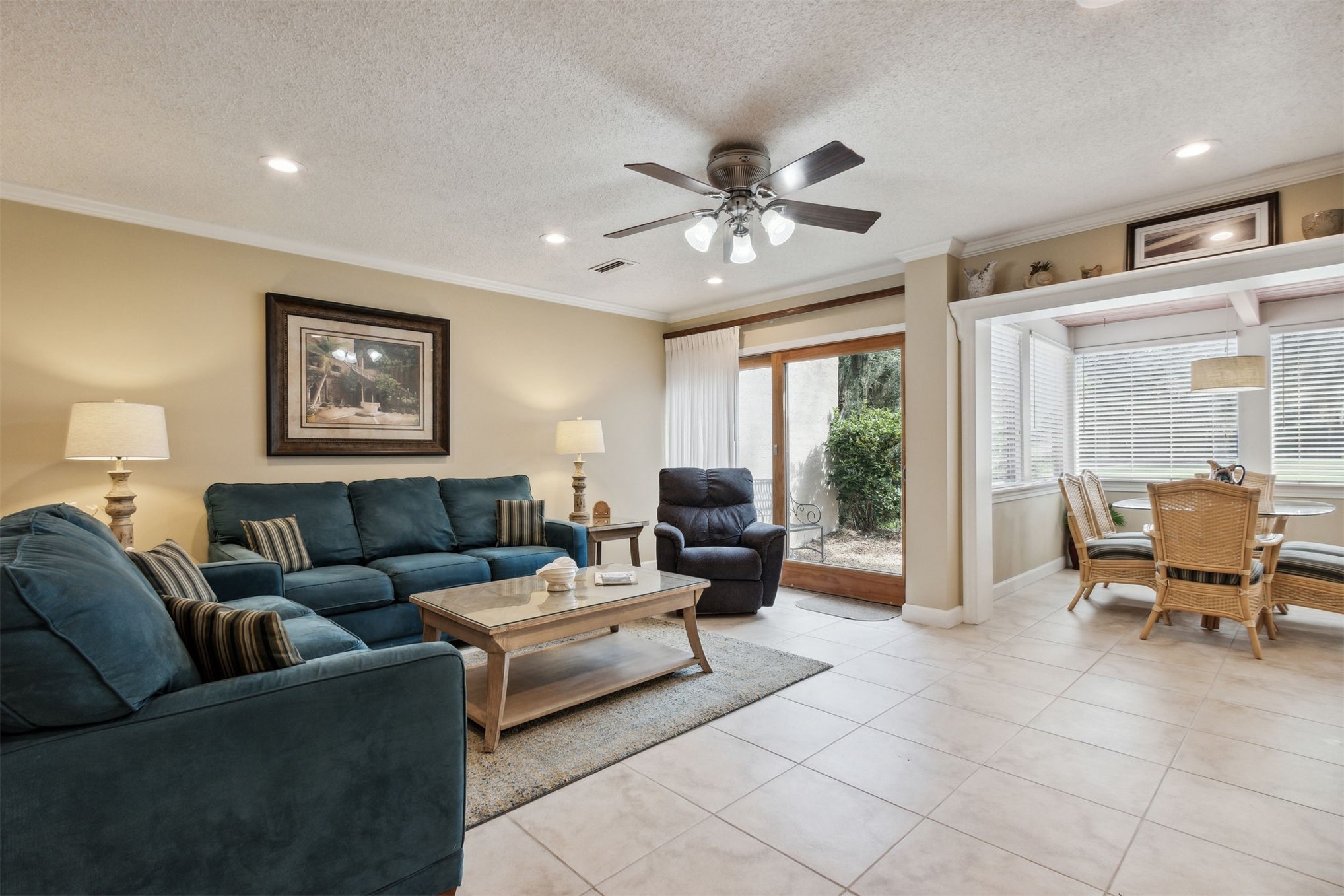 3327 Sea Marsh Road, Unit 3327 Fernandina Beach, FL 32034 - Photo 10 of 39 a living room with furniture and a large window