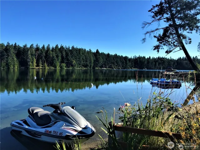 a lake view with a sitting space and lake view