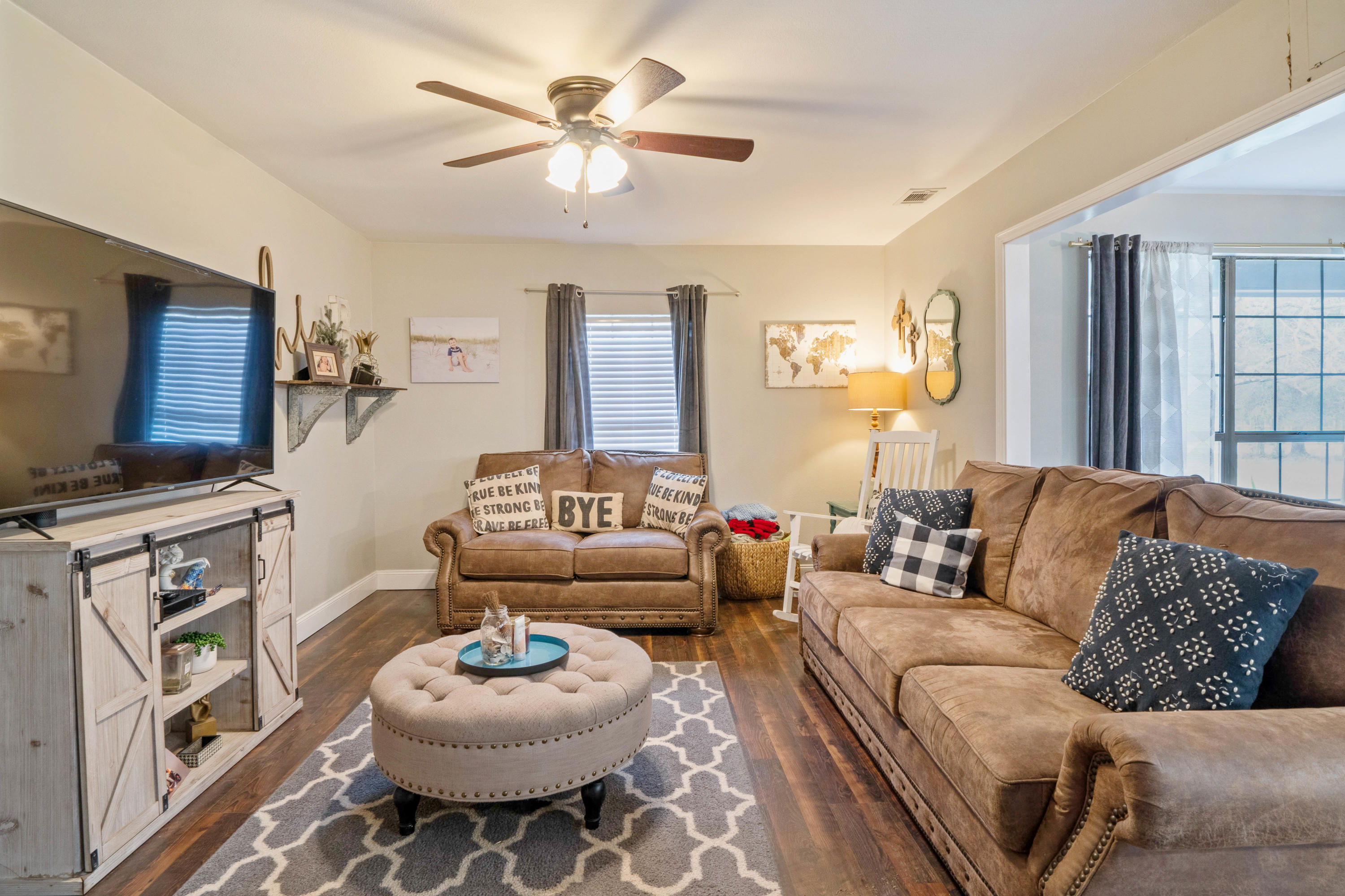 6086 Robin Road Crestview, FL 32539 - Photo 14 of 30 a living room with furniture and a flat screen tv