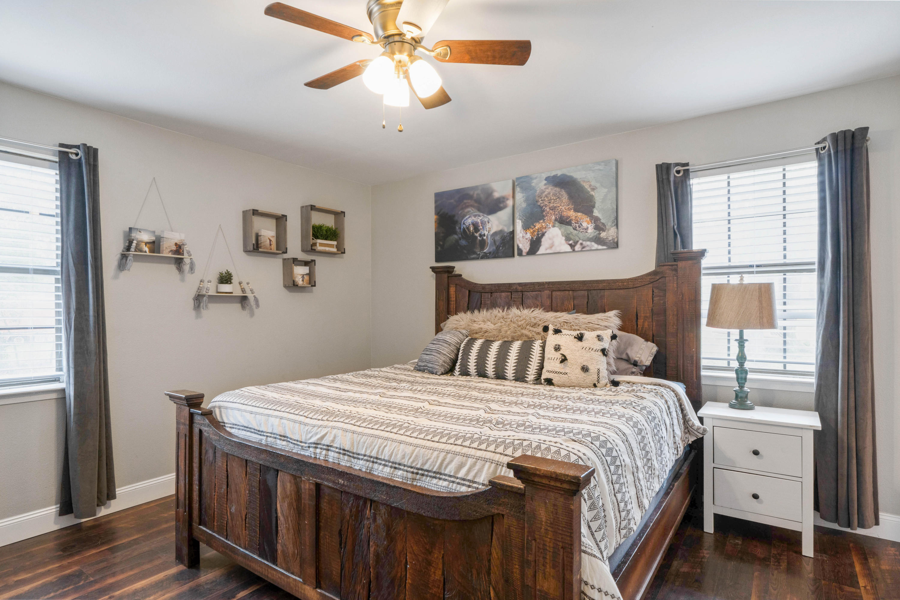 6086 Robin Road Crestview, FL 32539 - Photo 20 of 30 a bedroom with a bed and a chandelier