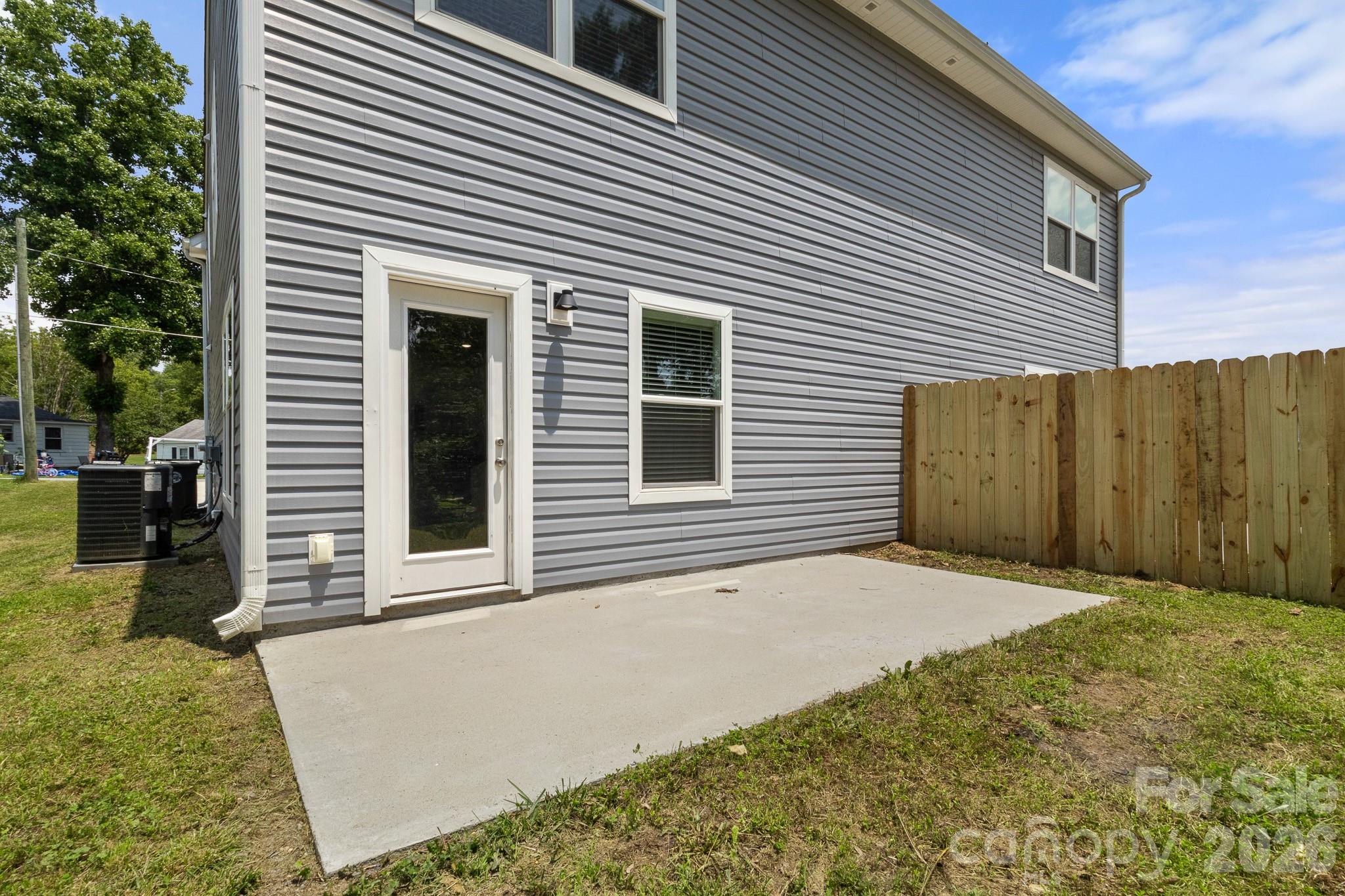 112 Angle Street Cherryville, NC 28021 - Photo 28 of 46 a front view of a house with a garage