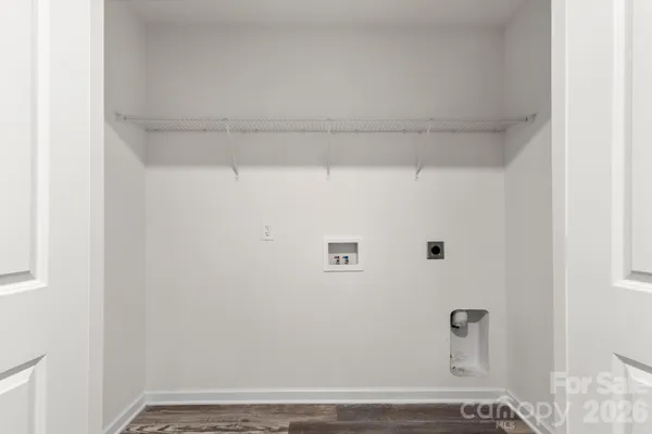 a view of small space with racks on the wall