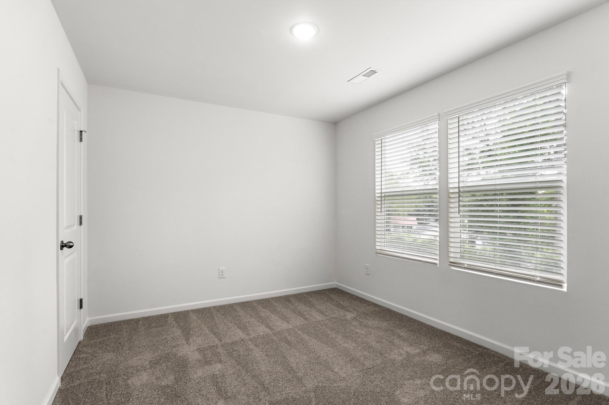 112 Angle Street Cherryville, NC 28021 - Photo 43 of 46 a view of an empty room with a window
