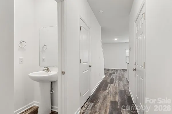 a bathroom with a sink a mirror and a shower