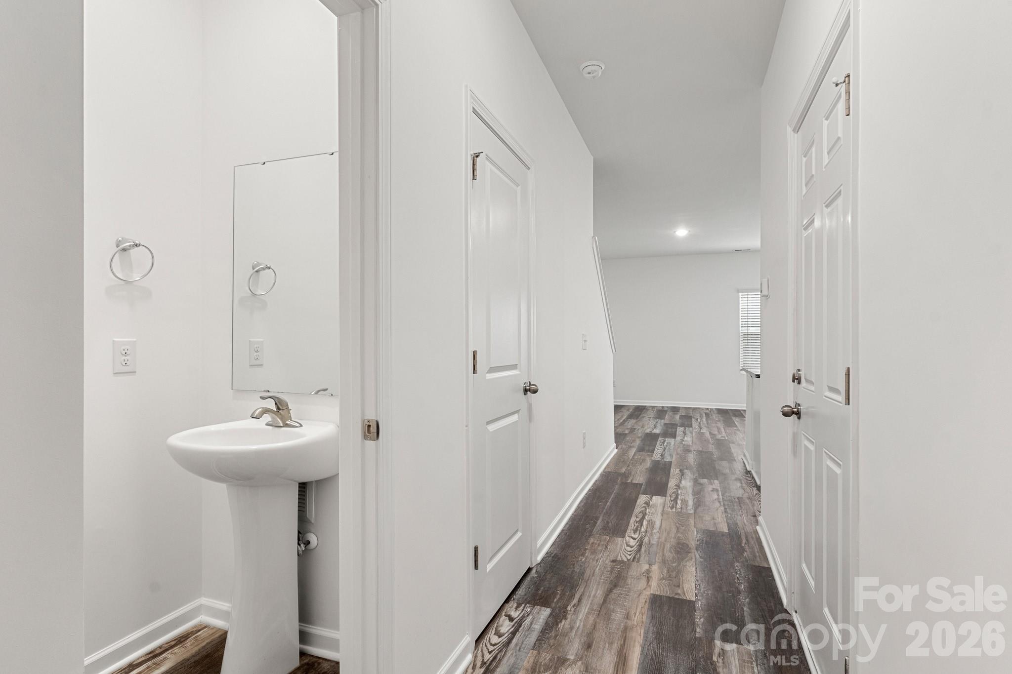 112 Angle Street Cherryville, NC 28021 - Photo 5 of 46 a bathroom with a sink a mirror and a shower
