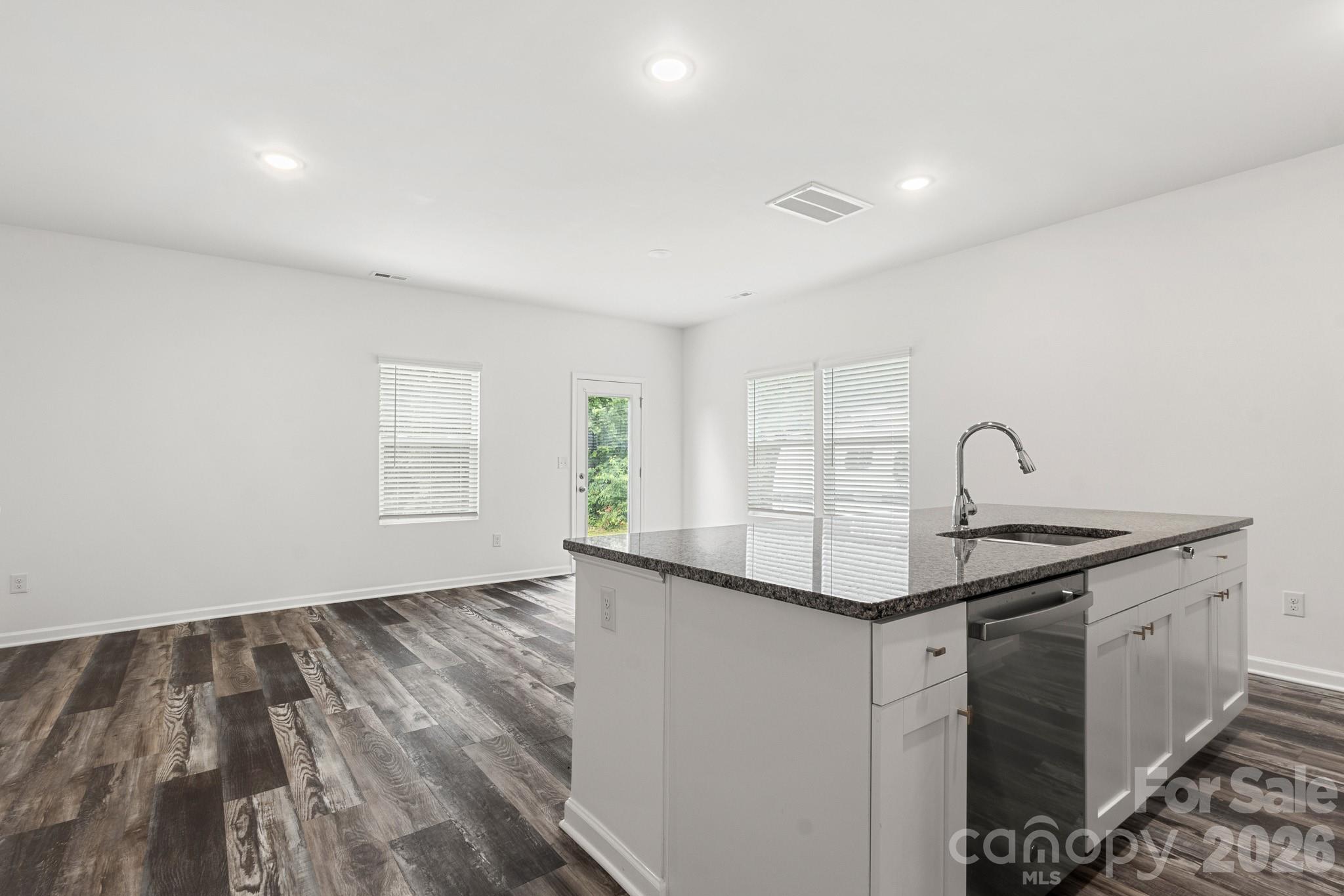 112 Angle Street Cherryville, NC 28021 - Photo 6 of 46 a view of a kitchen with a sink and dishwasher