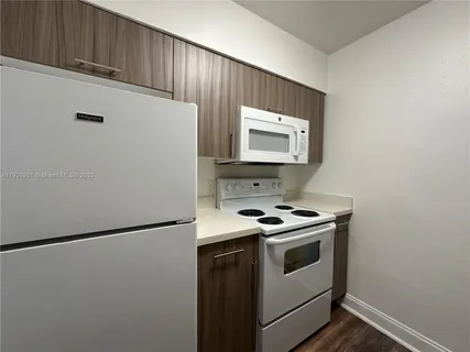 a utility room with washer and dryer