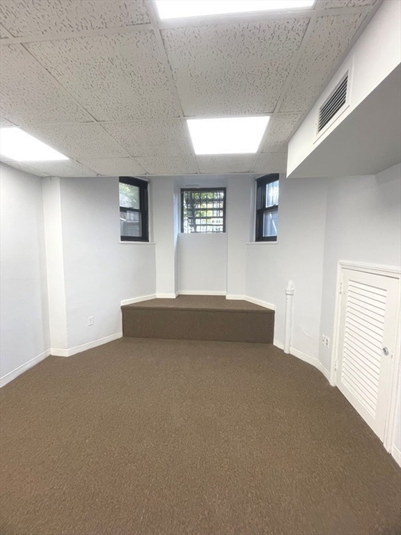 475 Commonwealth Avenue, Unit G3 Boston, MA 02215 - Photo 6 of 20 a view of an empty room with a window