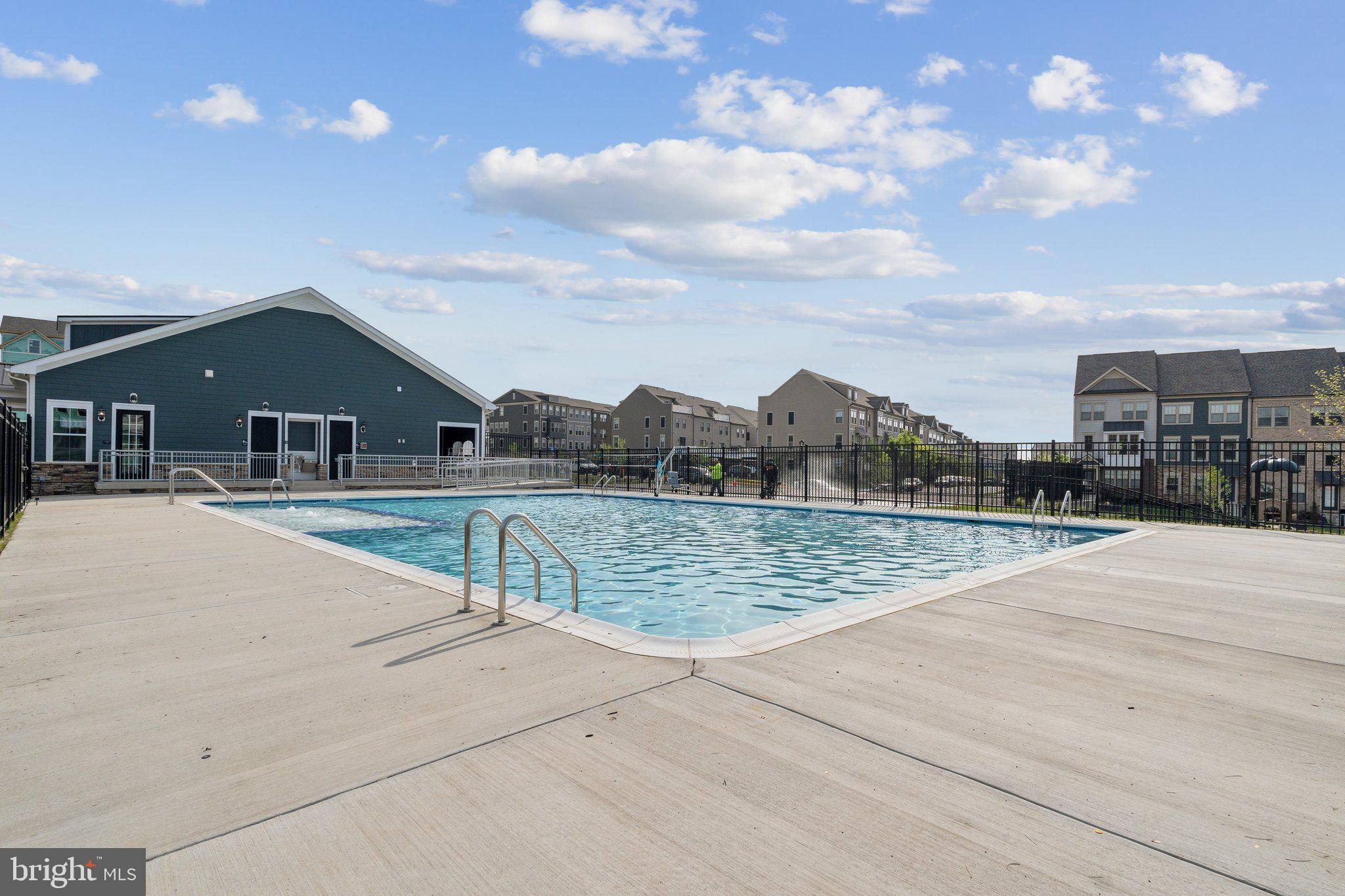 1047 Inferno Terrace Southeast Leesburg, VA 20175 - Photo 25 of 29 a view of house with swimming pool and yard