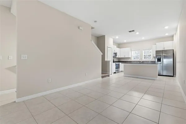 a view of a kitchen with a sink