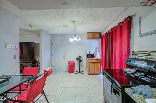 a room with furniture and a flat screen tv