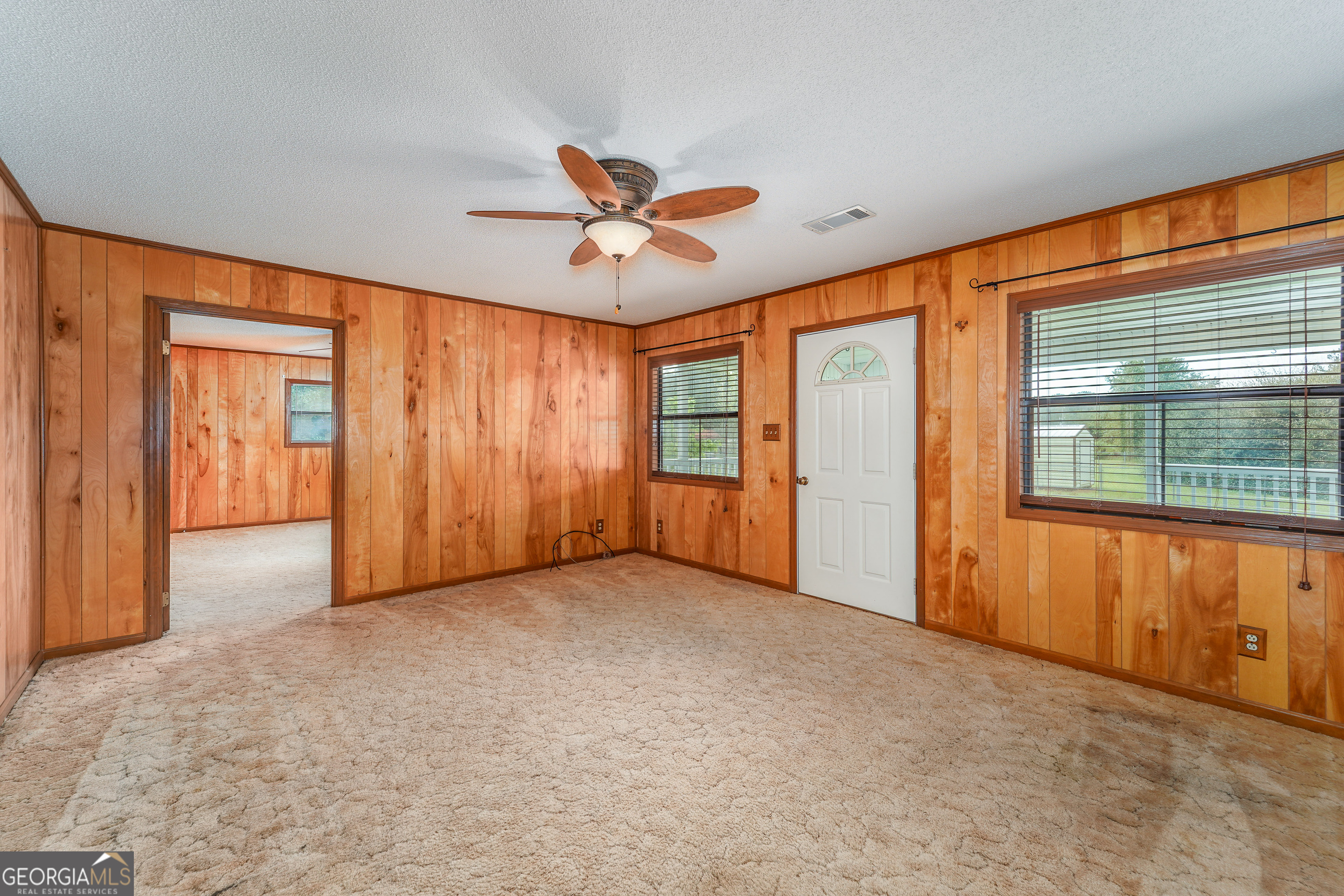 603 Cumberland Road Hortense, GA 31543 - Photo 11 of 26 wooden floor in an empty room with a window