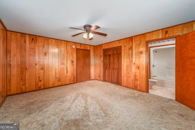 wooden floor in an empty room and a window