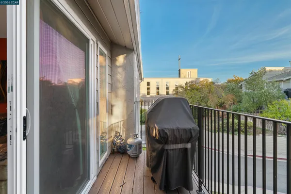 a view of balcony with furniture