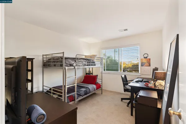 a bedroom with furniture