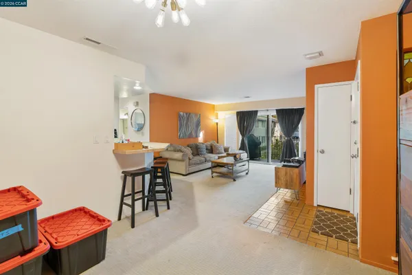a view of a workspace with furniture and a livingroom