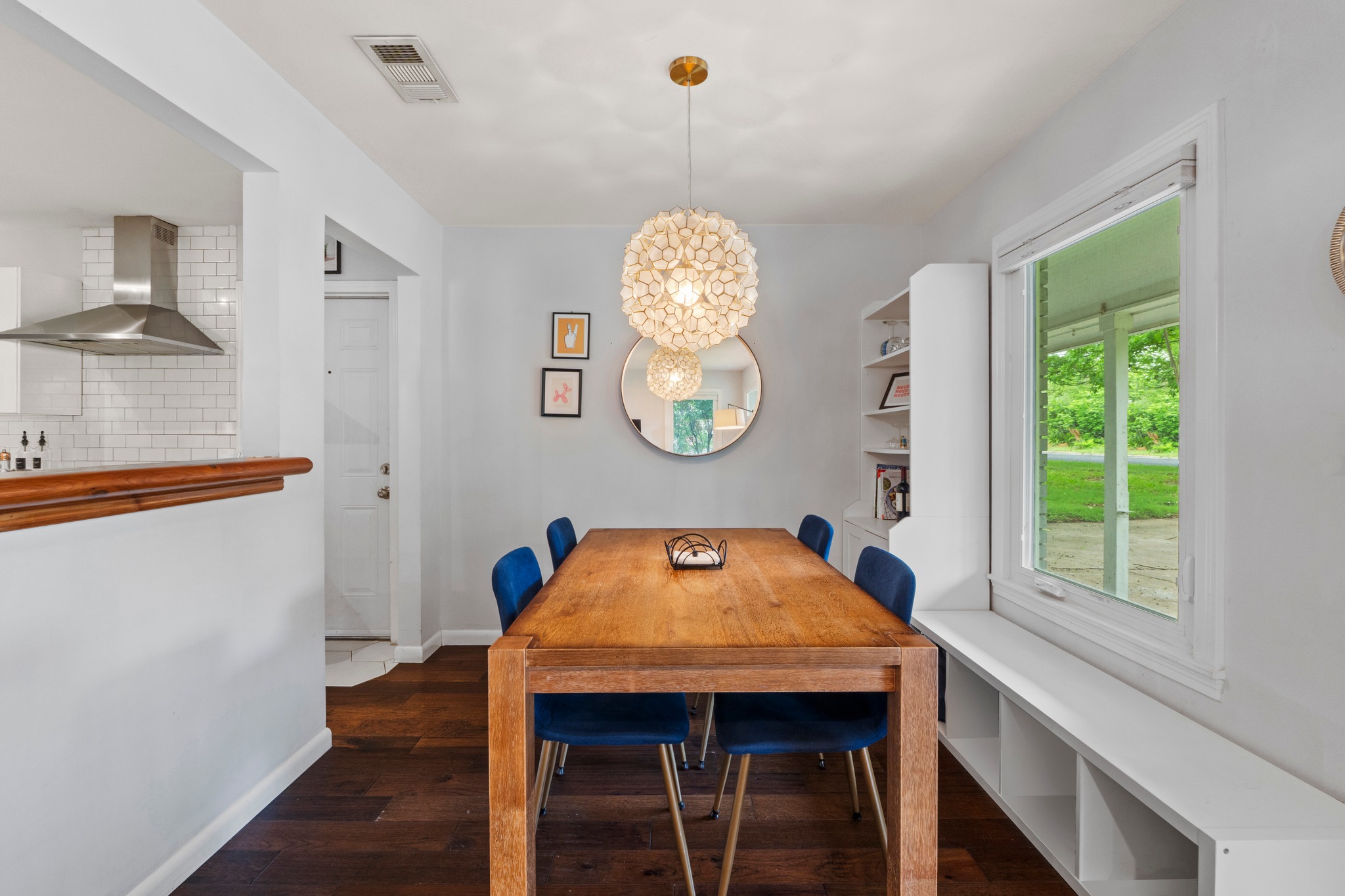 1301 Ridgemont Drive Austin, TX 78723 - Photo 15 of 32 a dining room with a window a table and chairs
