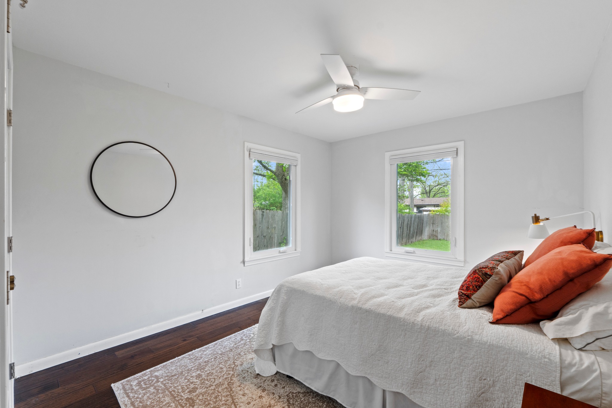 1301 Ridgemont Drive Austin, TX 78723 - Photo 25 of 32 a bedroom with a bed and a window