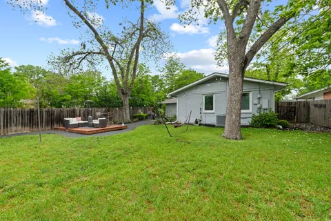 a house view with a garden space