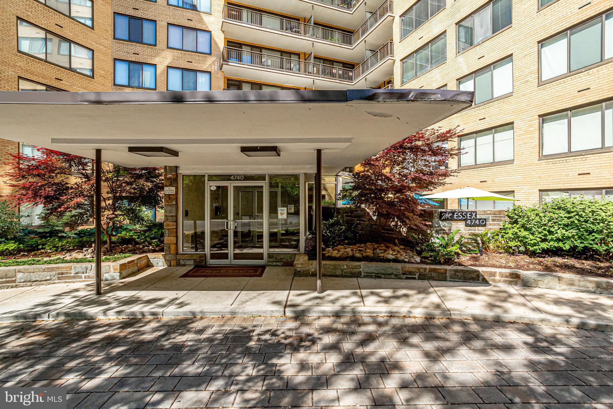 4740 Connecticut Avenue Northwest, Unit 404 Washington, DC 20008 - Photo 24 of 24 a view of a building with a window and a tree