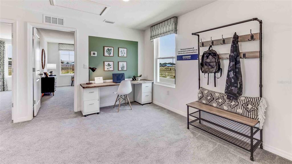 17811 Acorn Drop Road Land O Lakes, FL 34638 - Photo 3 of 11 a living room with furniture and a table