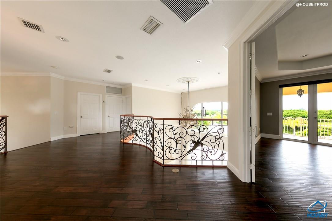 4524 Southwest 195th Way Miramar, FL 33029 - Photo 17 of 36 a view of an entryway with wooden floor