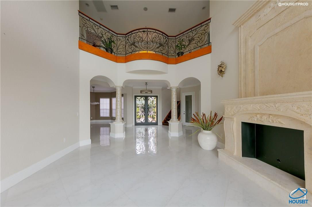 4524 Southwest 195th Way Miramar, FL 33029 - Photo 20 of 36 a view of an entryway with a fireplace
