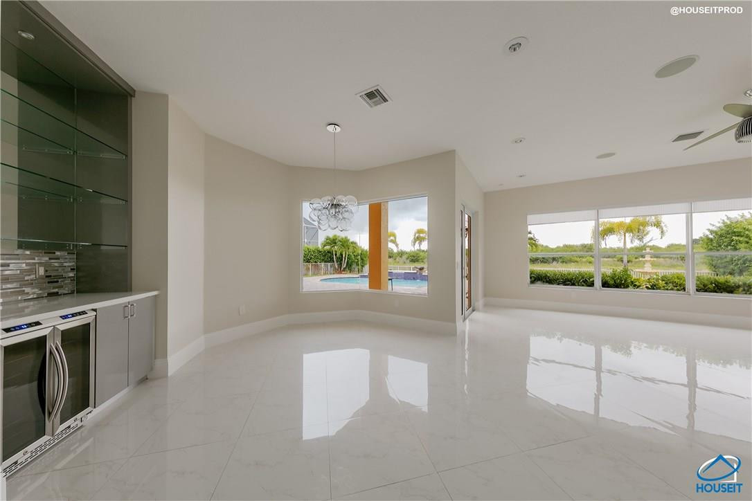 4524 Southwest 195th Way Miramar, FL 33029 - Photo 31 of 36 a view of a kitchen with a sink and large windows
