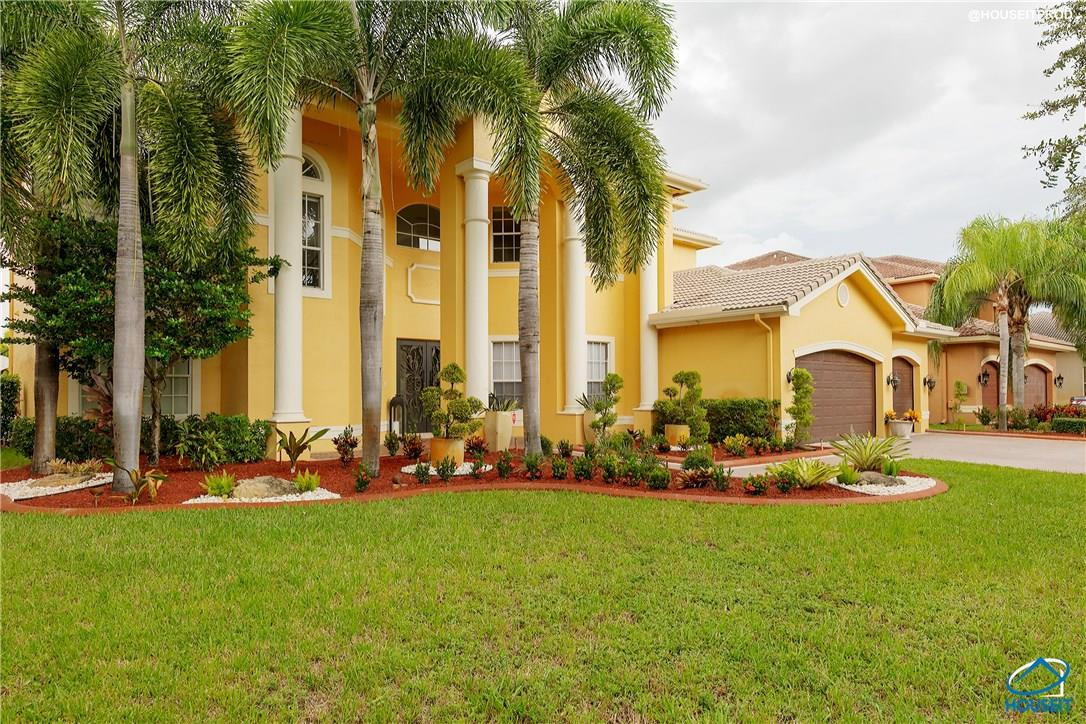 4524 Southwest 195th Way Miramar, FL 33029 - Photo 4 of 36 a front view of multiple house with yard