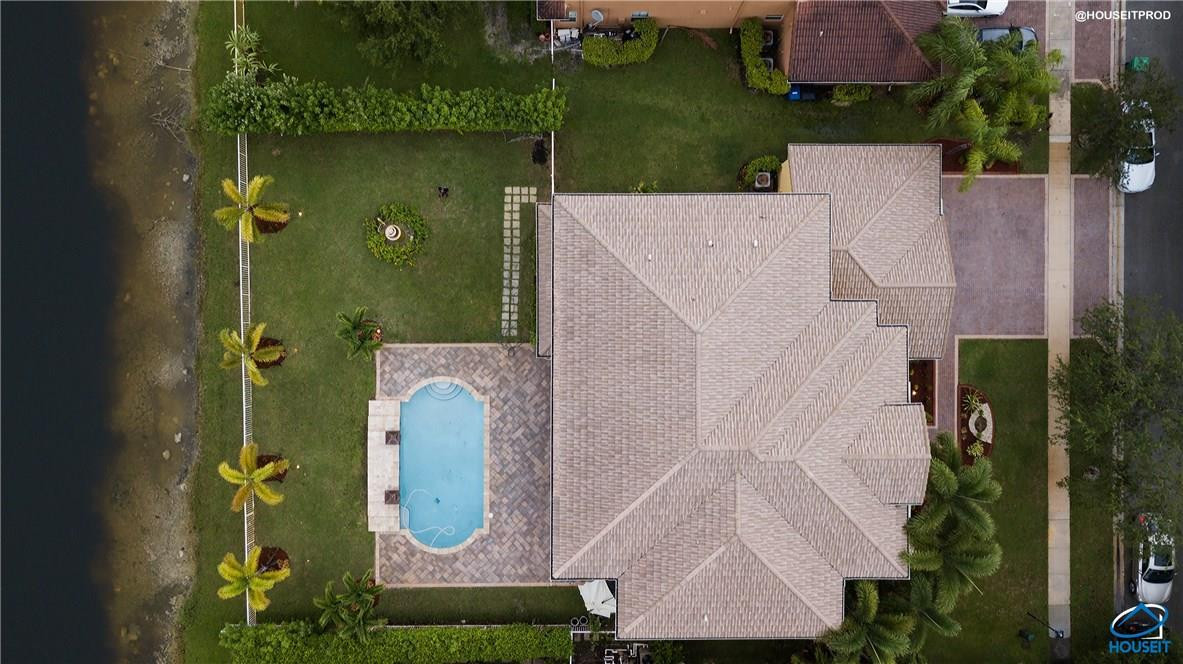 4524 Southwest 195th Way Miramar, FL 33029 - Photo 6 of 36 an aerial view of a house with a yard