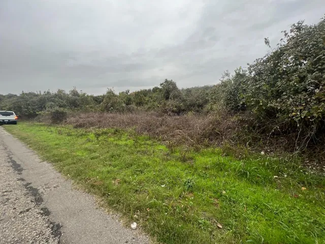 a view of a yard with an outdoor space and seating area