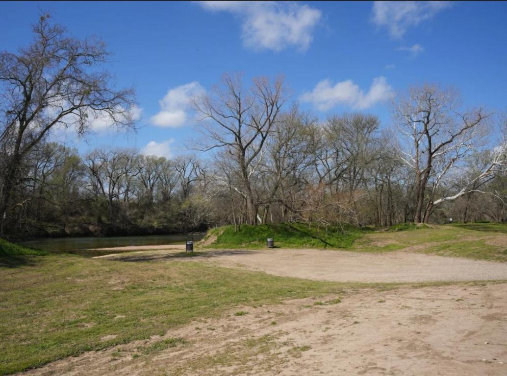 450 Riverside Drive Bastrop, TX 78602 - Photo 5 of 5 a view of outdoor space with trees