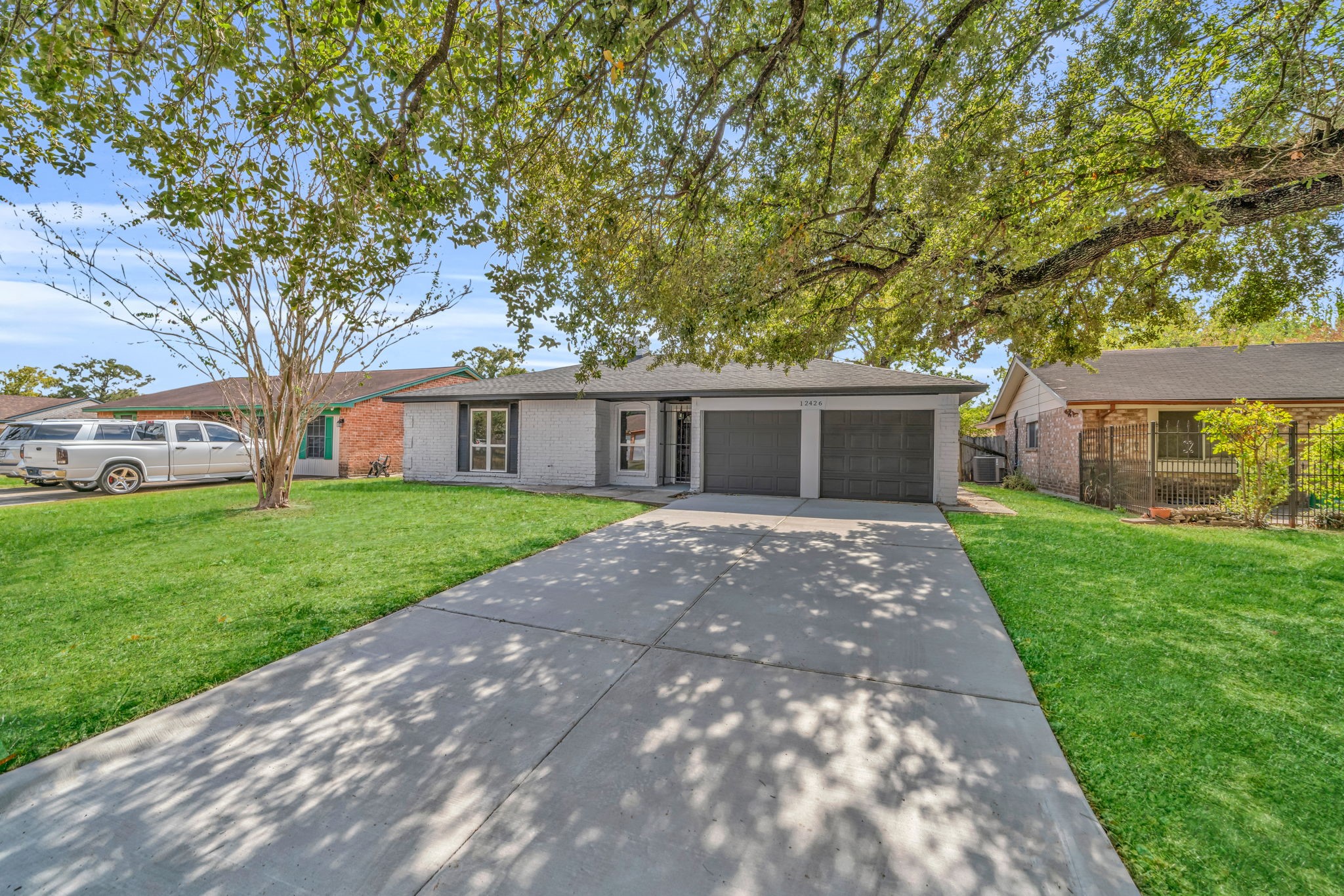 12426 Enchanted Path Drive Houston, TX 77044 - Photo 2 of 28 a view of house that has a yard