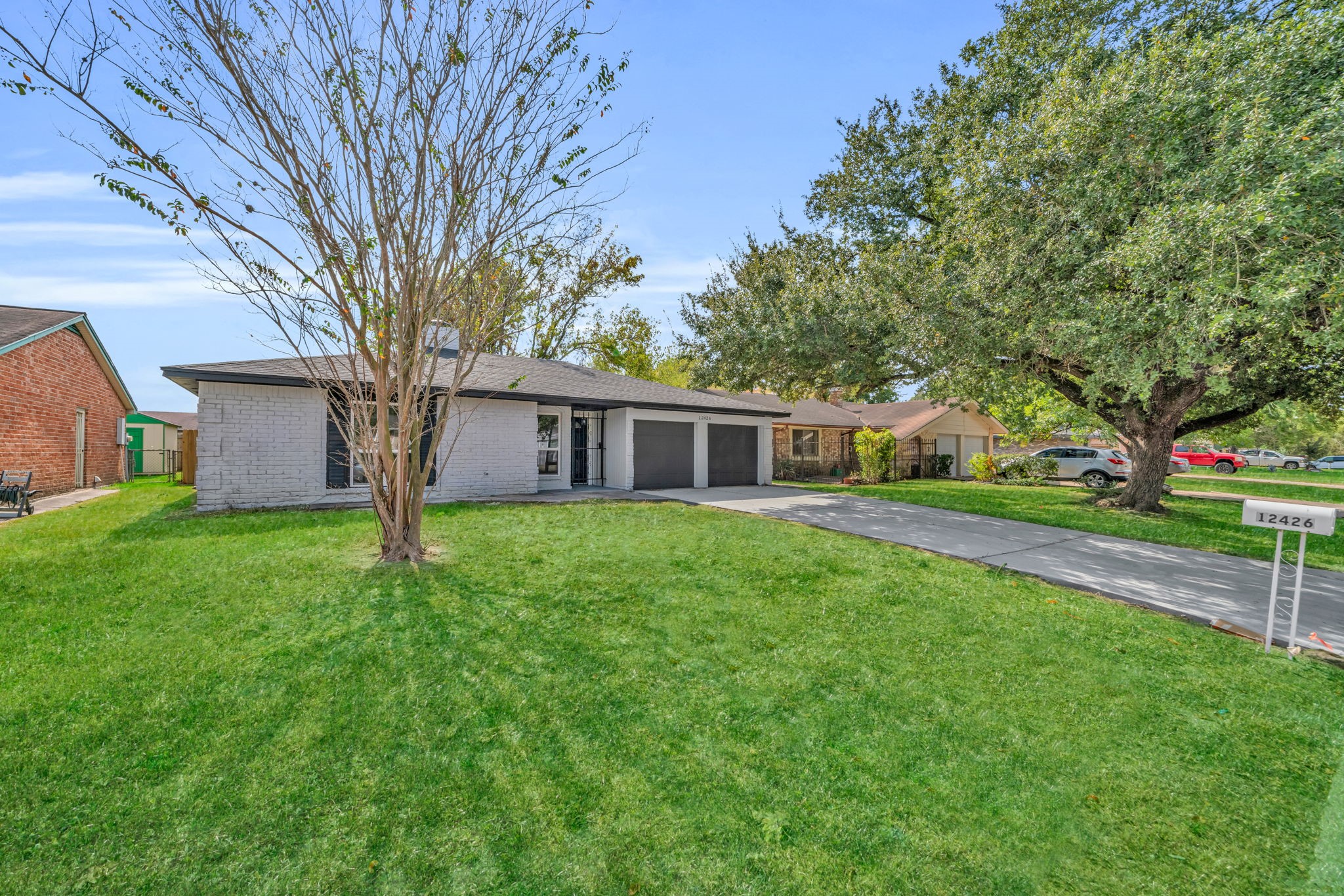 12426 Enchanted Path Drive Houston, TX 77044 - Photo 3 of 28 a front view of house with yard and green space