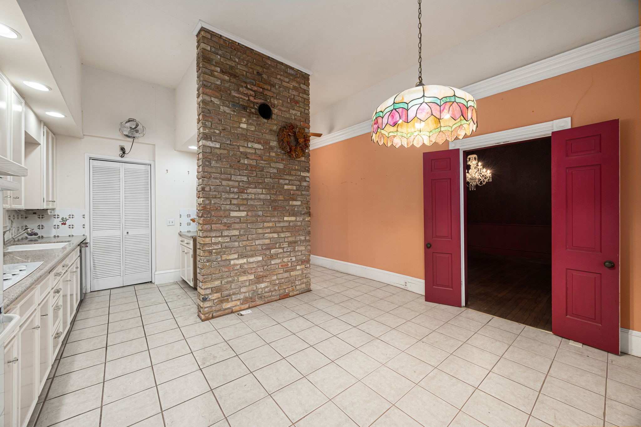 236 Preston Street Columbus, TX 78934 - Photo 16 of 50 a view of a hallway with chandelier