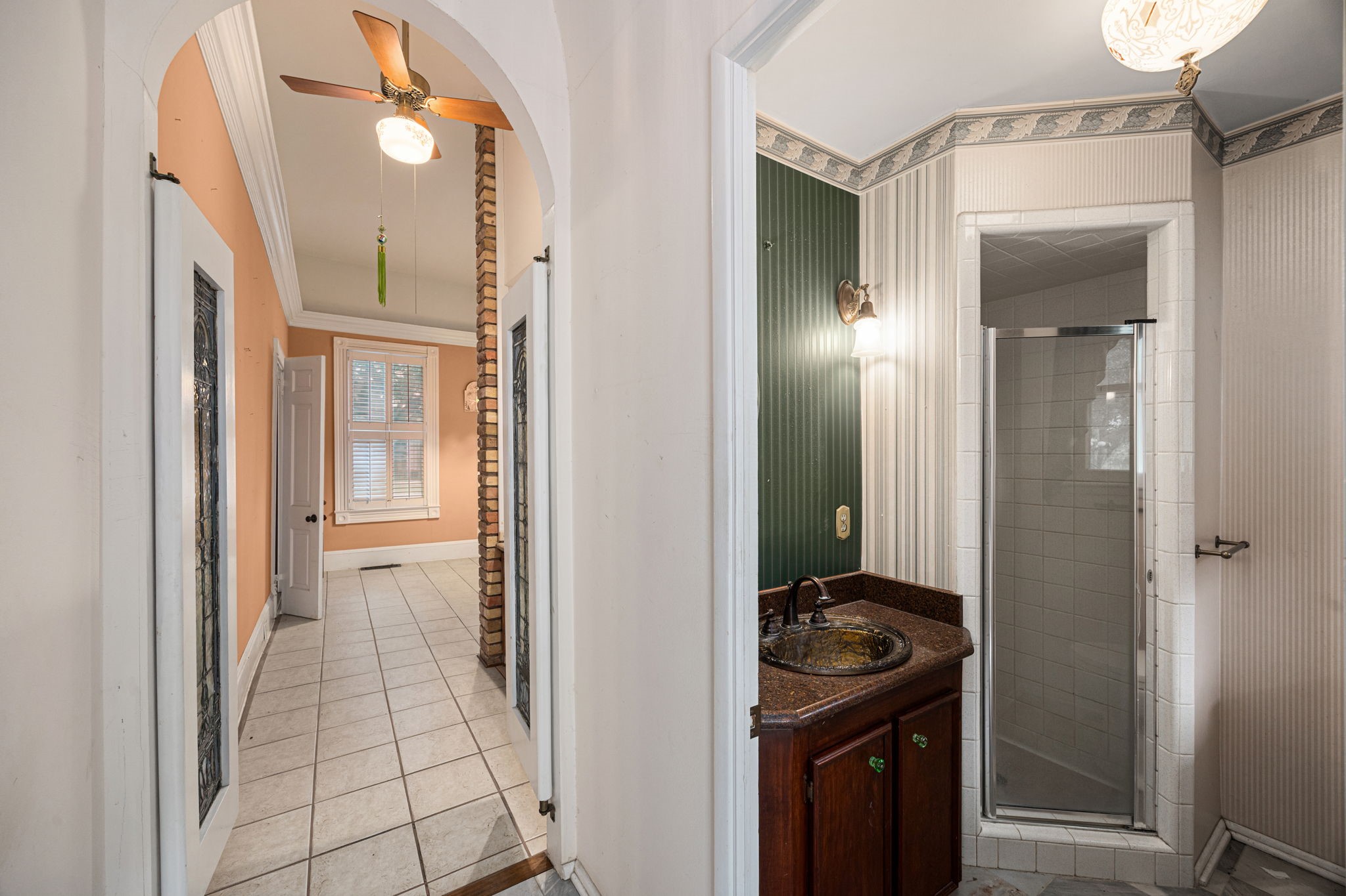 236 Preston Street Columbus, TX 78934 - Photo 23 of 50 a bathroom with a sink a mirror and a toilet