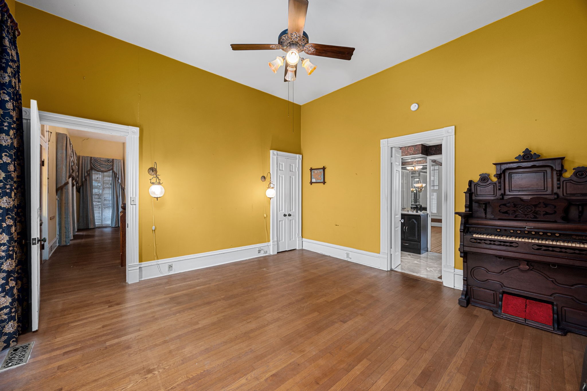 236 Preston Street Columbus, TX 78934 - Photo 27 of 50 a view of a livingroom with wooden floor and a kitchen space