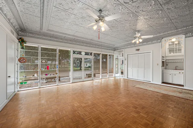 a view of an empty room with a window