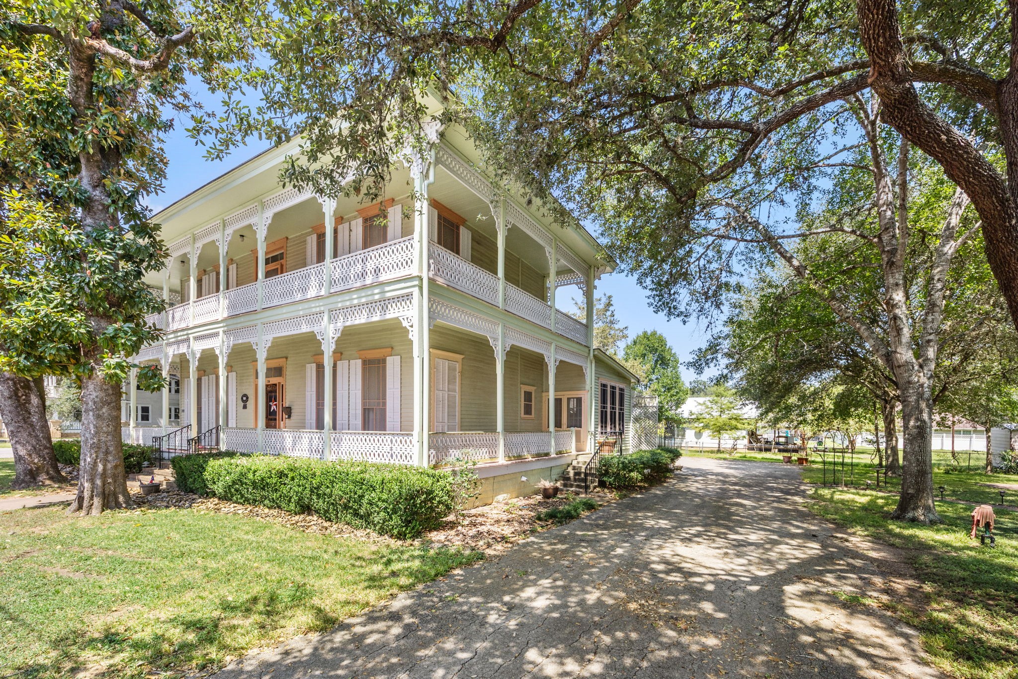 236 Preston Street Columbus, TX 78934 - Photo 39 of 50 a front view of a house with a yard