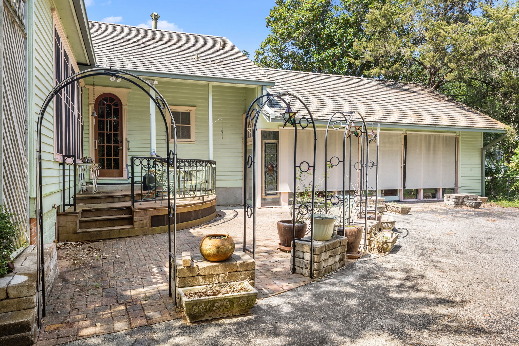 236 Preston Street Columbus, TX 78934 - Photo 41 of 50 a view of house with patio outdoor seating and covered with trees