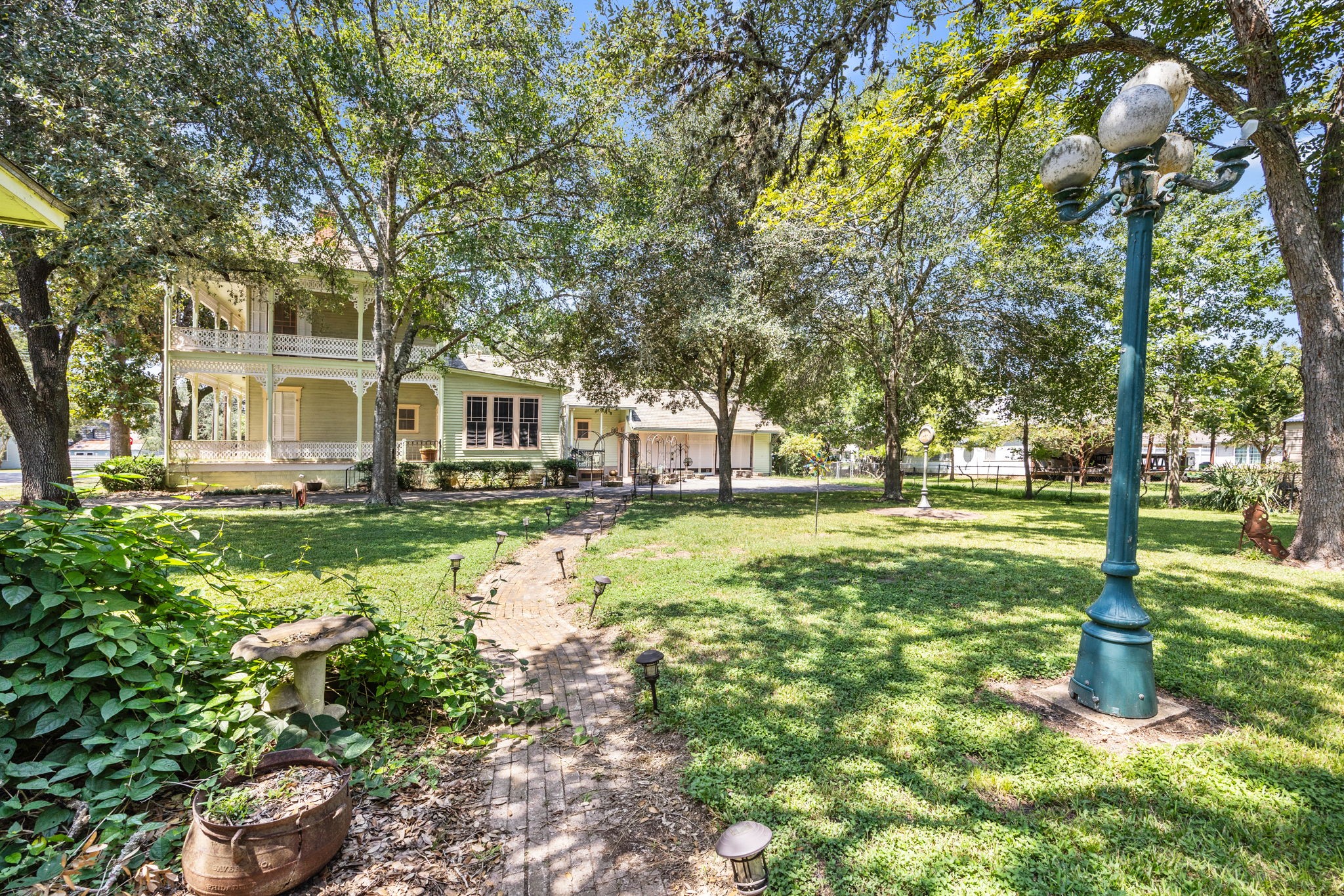 236 Preston Street Columbus, TX 78934 - Photo 44 of 50 a view of a house with a yard