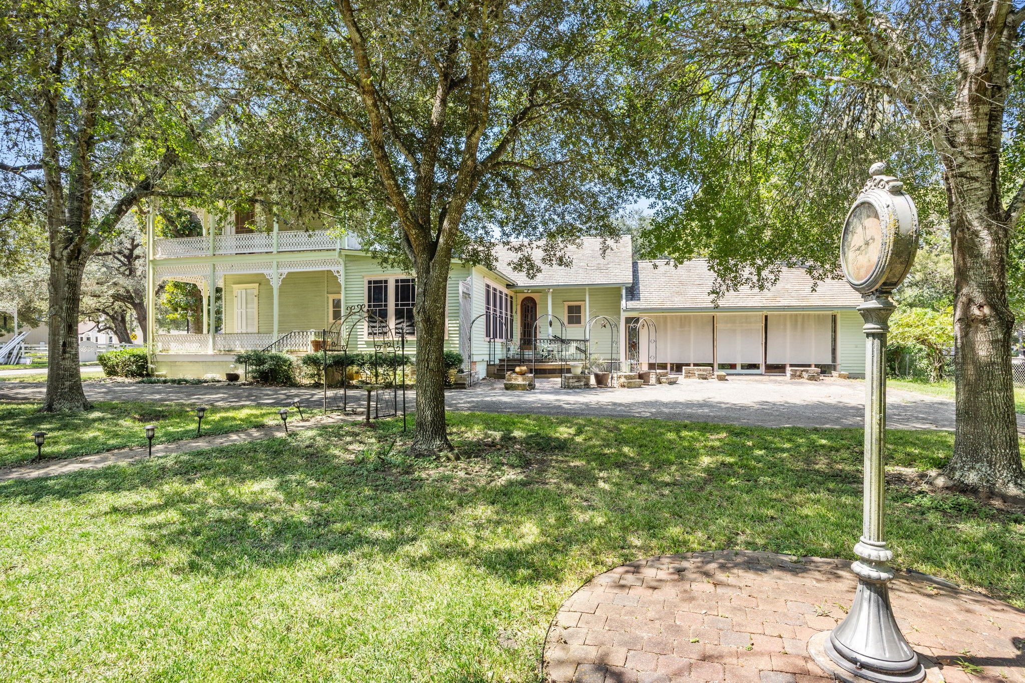 236 Preston Street Columbus, TX 78934 - Photo 45 of 50 a front view of a house with a garden