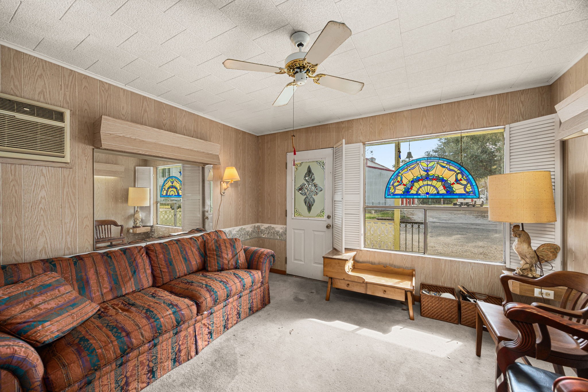236 Preston Street Columbus, TX 78934 - Photo 46 of 50 a living room with furniture a rug and a ceiling fan